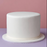 Professional cake artist covering a round cake tier with FondX Virgin White rolled fondant.